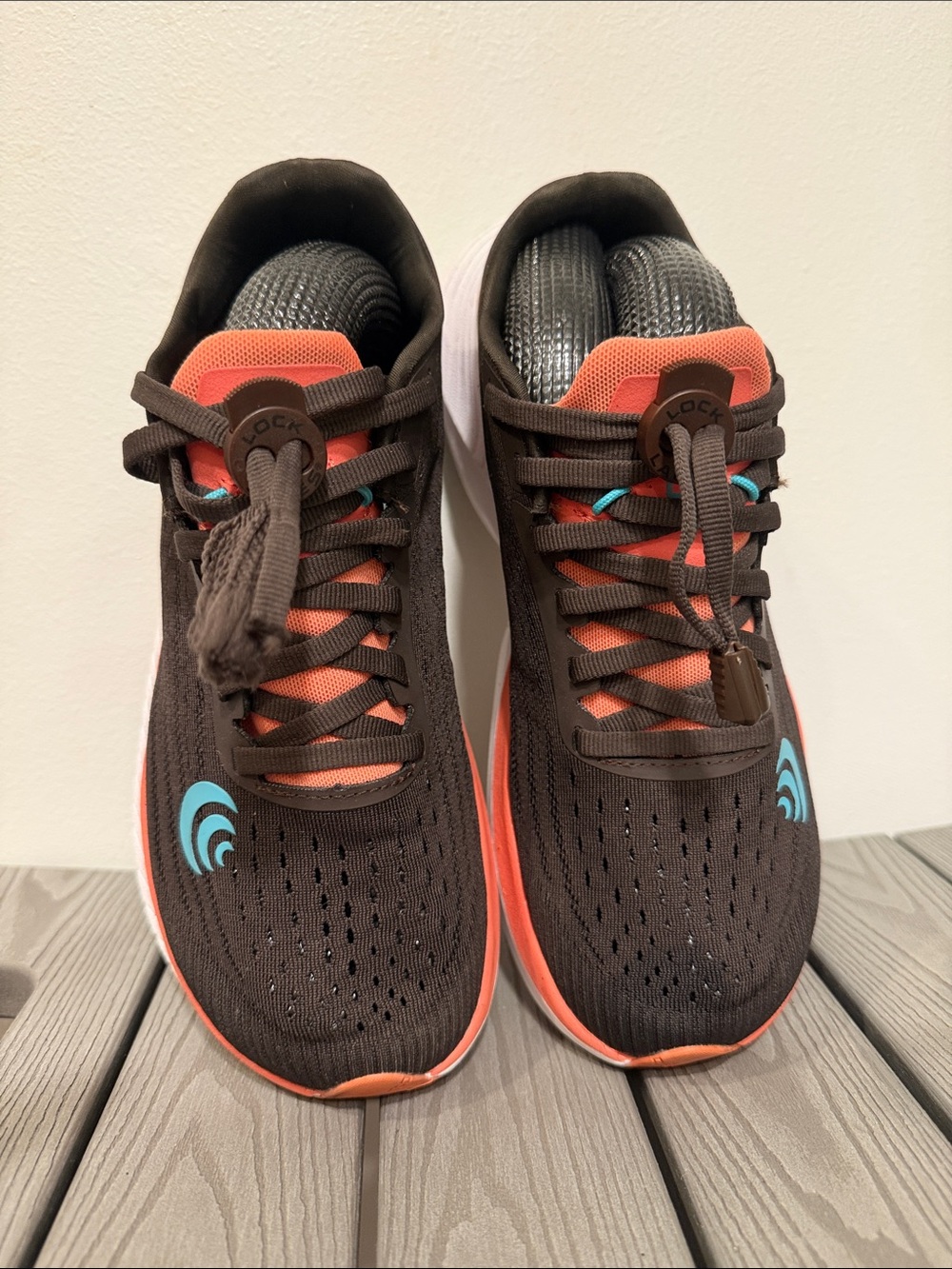 Brown Athletic Running Shoes with Coral and Teal Accents